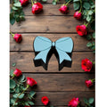 Blue bow straw topper